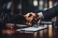 shaking hands in agreement